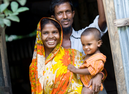 Family with young child in Bangladesh. Photo credit: Afsana Begum Orthy