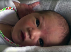 Still of a newborn from the film "Father Is Not A Visitor."