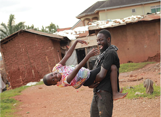 Father swinging son