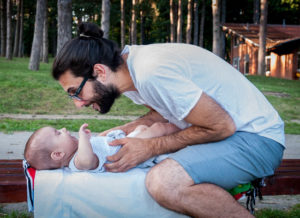 A father looks affectionately at his baby. Photo: Branko Birač / Centar E8.