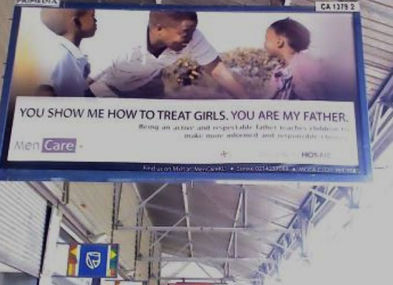 A billboard from the MenCare South Africa campaign that reads, "You Show Me How to Treat Girls. You Are My Father."