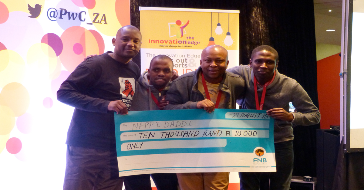 The winning team of developers that created mobile app NappiDaddi pose with their award.
