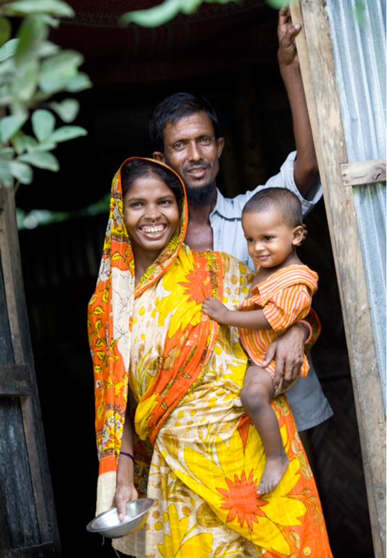 Family with young child in Bangladesh. Photo credit: Afsana Begum Orthy