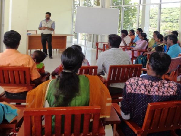 Participants listen to an introduction about MenCare.