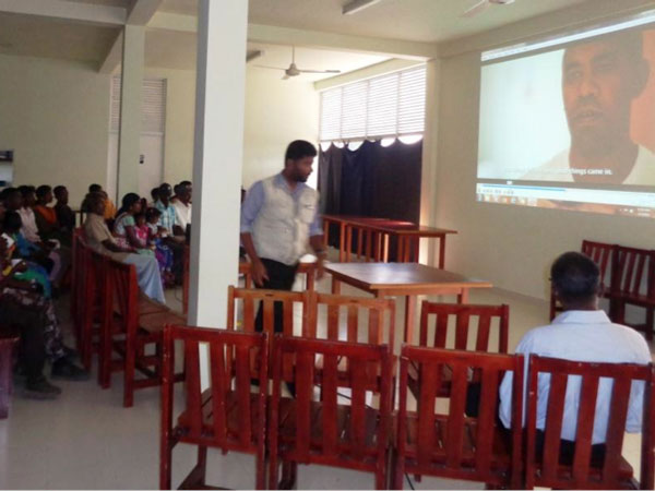 MenCare participants watch the MenCare Brazil Film: Marcio’s Story.