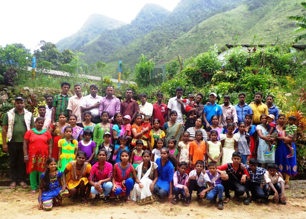 Group photo of participants in the Ambagamuwa ADP's June 2016 MenCare family retreat.