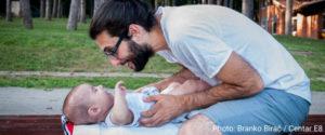 A father looks affectionately at his baby. Photo: Branko Birač / Centar E8.