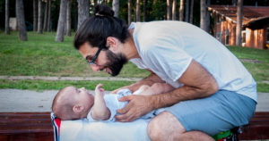 A father looks affectionately at his baby. Photo: Branko Birač / Centar E8.