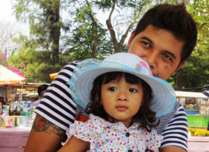 A daughter and father.