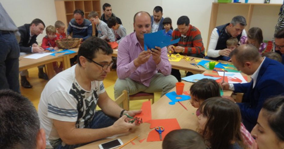 Fathers and children in kindergarten in Bulgaria.