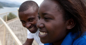A smiling couple. Photo by Seth Chase (2014).