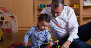 A father and child play together. Photo courtesy of AÇEV.